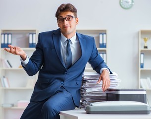 Businessman making copies in copying machine