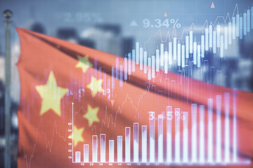 Double exposure of virtual creative financial diagram on Chinese flag and city background, banking and accounting concept