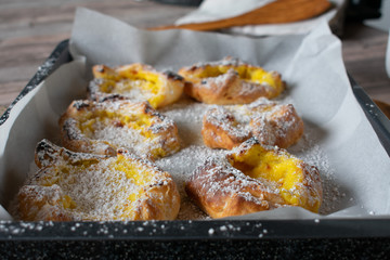 close up of puff pastries on a baking tray