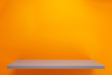 shelf at abstract wall background