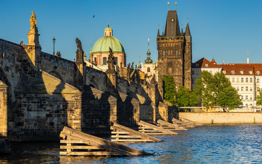 Fototapeta na wymiar Famous Charles Bridge In Prague on a beautiful summer afternoon