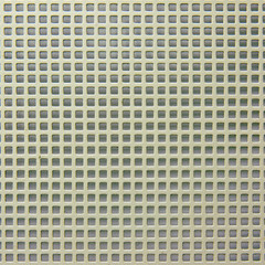 Metal grid of uniform square holes, close-up background