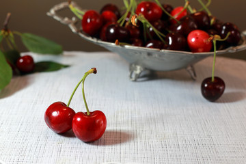 Cherry basket. cherry tree branch. fresh ripe cherries.