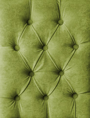 Green capitone velours textile decoration with buttons