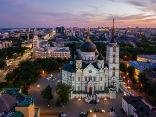 Evening summer Voronezh cityscape. Annunciation Cathedral and Tower of Management of South-east railway at sunset