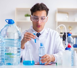 Fototapeta premium Lab assistant testing water quality
