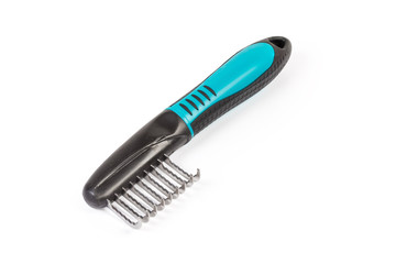 Comb for remove tangles of pets fur on white background