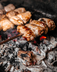 Selective focus on cooking shashlyq with meat 