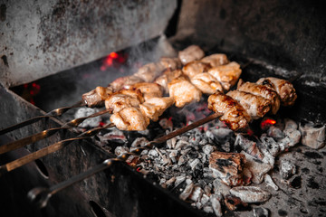 Selective focus on cooking shashlyq with meat 