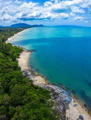 Fototapeta na wymiar Aerial view image of sea, beache and jungle with blue sky in Nakhon Si Thammarat, Thailand