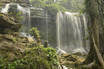 Man Fah waterfall after heavy rainfall in deep forest at Thap Lan National Park, Thailand.