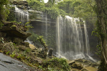 Man Fah waterfall after heavy rainfall in deep forest at Thap Lan National Park, Thailand.