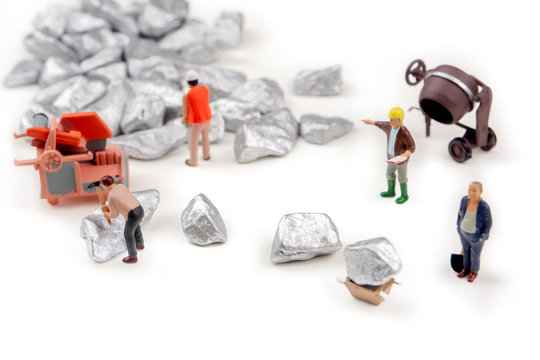 digging silver, platinum ore on white background
