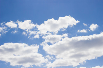 Naklejka na ściany i meble white clouds on the blue clear sky