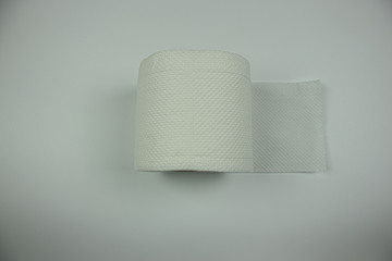 roll of toilet paper on white background