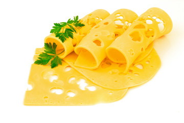 Rolled thin slices of hard yellow cheese with holes and parsley isolated on white background - 373458428