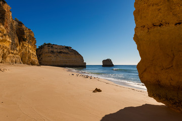 View of the scenic Marinha Beach (Praia da Marinha) in the Algarve region, Portugal; Concept for travel in Portugal and summer vacations.