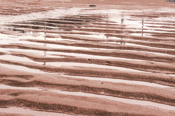waves texture small sand banks.