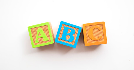 ABC letters made from colourful wooden baby development blocks