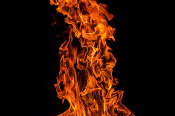 Fire flame isolated on black background, abstract texture
