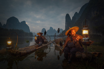 Chinese traditional fisherman with cormorants fishing, Li River