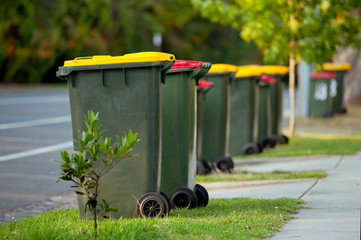 Recycling bin stands outdoor. Australia, Melbourne. - obrazy, fototapety, plakaty