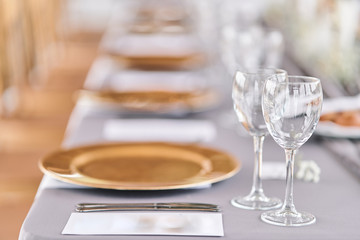 Table set for an event party or wedding reception. Banquet table design