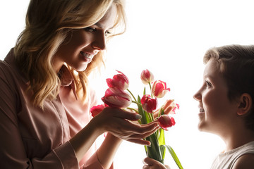 Woman and child with a bouquet of tulips