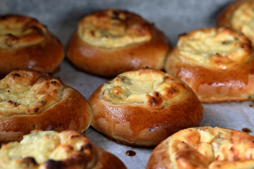 Russian Creamcheese Vatrushka Buns. Sweet buns with cottage cheese and raisins.