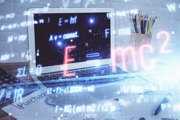 Desktop computer background and formula hologram writing. Double exposure. Education concept.