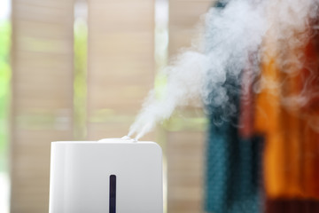 Modern air humidifier at home, closeup view