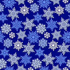 Different white and blue openwork snowflakes on a blue background. Vector seamless pattern for festive design, Christmas wallpaper, banner, packaging, wrapping paper, wrapper, printing on textile
