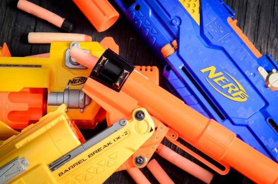 London, England - May 05, 2014: Nerf Dart Gun and Foam Bullets, Nerf was founded in 1969 and is currently owned by Hasbro.  