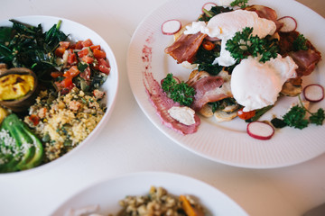 From above picture of dishes with tasty healthy food flat lay on table for healthy balanced lunch, colorful mix of salads and ingredients for fresh dieting and low fat delicious cuisine