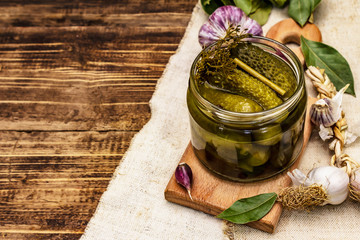 Marinated pickled cucumbers with spices and herbs