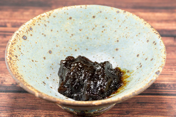 Seaweed laver preserved in soy sauce as a side dish in Japan.