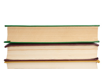 stack of various books, items are isolated on white background