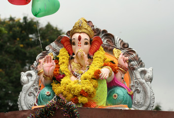 View of Indian Hindu God Ganesha Idol ,being transported for immersion in water bodies,at the end of chathurthi festival,for 10 days