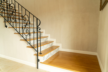 stair step with black handrail