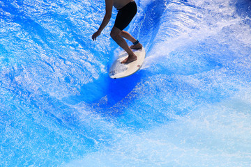 surfer rides the ocean wave