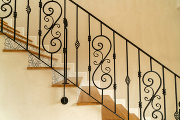 stair step with black handrail
