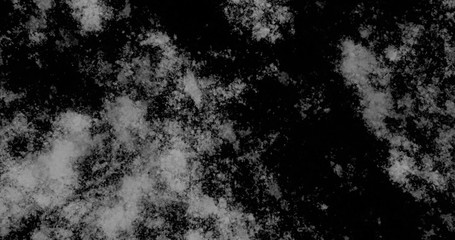 Vibrant abstract background for design. Blurry gray spots on a black background.