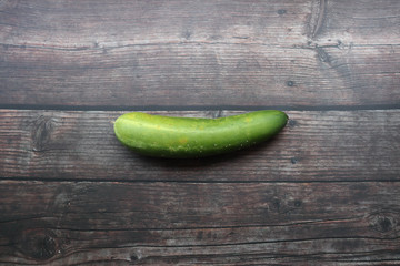 cucumber on a wooden table