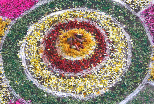 Close-up view of Indian Hindu religious Rangoli pattern of flower decoration on floor of temple,house and other important places