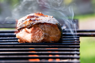 fish is baked on the grill, on the fire
