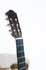 Spanish guitar musical instrument perched on a tripod