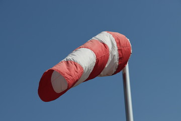 windsock,a conical textile tube that resembles a giant sock and can be used as a basic guide to...