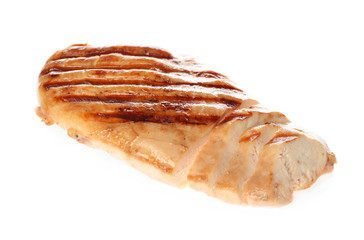 Tasty cut grilled chicken fillet isolated on white