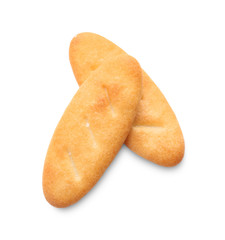 Delicious crispy crackers isolated on white, top view