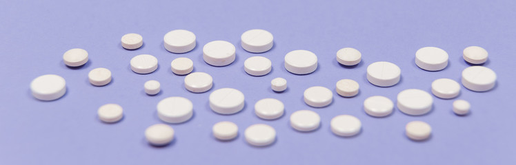 White pill on a purple background with copy space.